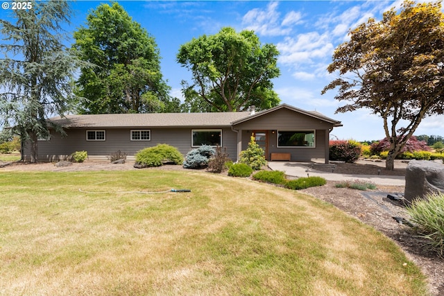 8747 S Heinz Rd, Canby, OR 97013 - rear view of house featuring a yard