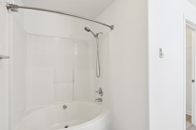 full bath featuring shower / washtub combination