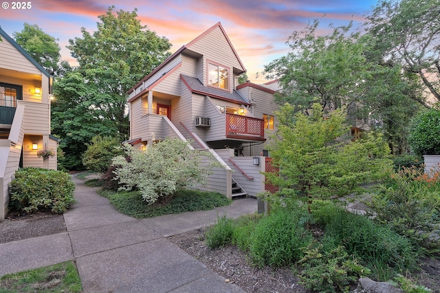 2805 NW Upshur St Unit B, Portland, OR 97210 - view of front of home featuring stairs and cooling unit