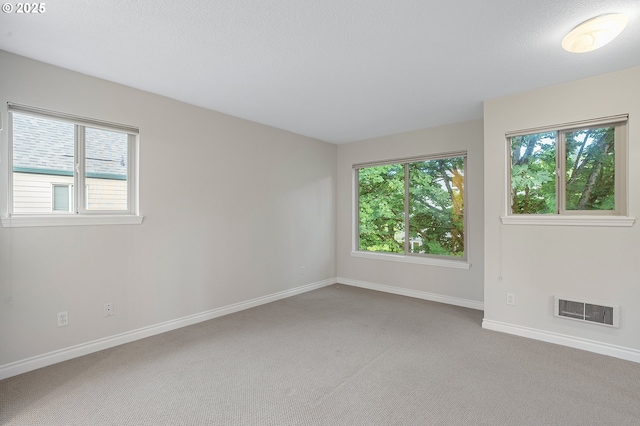 2805 NW Upshur St Unit B, Portland, OR 97210 - carpeted empty room featuring baseboards
