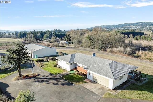 bird's eye view with a mountain view