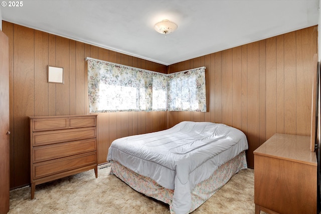 carpeted bedroom featuring a baseboard heating unit