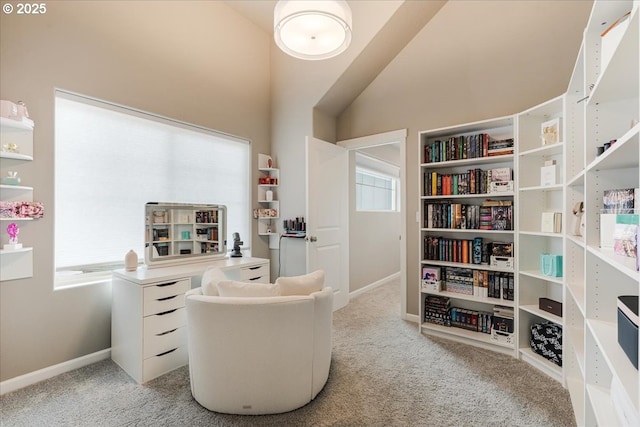 sitting room with light carpet and baseboards