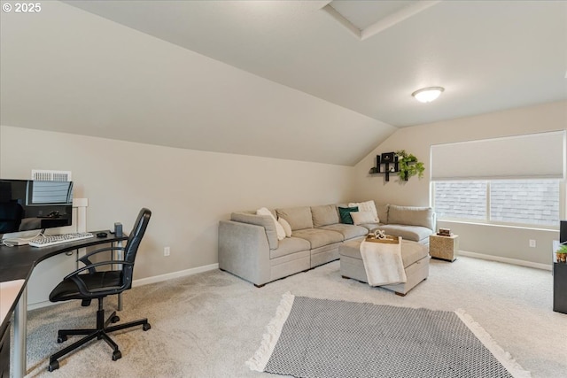 office with carpet floors, vaulted ceiling, and baseboards