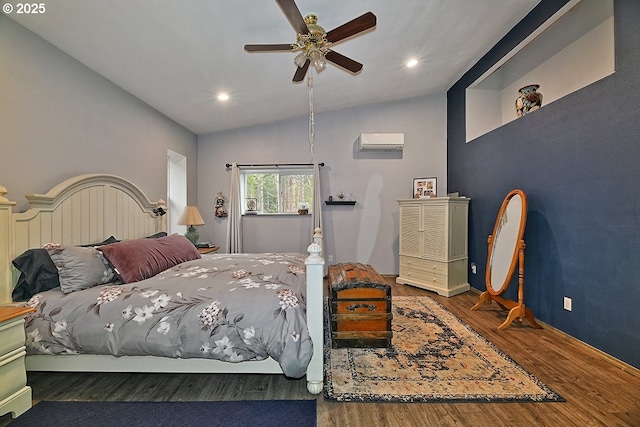 bedroom featuring a wall unit AC, ceiling fan, dark wood-type flooring, and vaulted ceiling