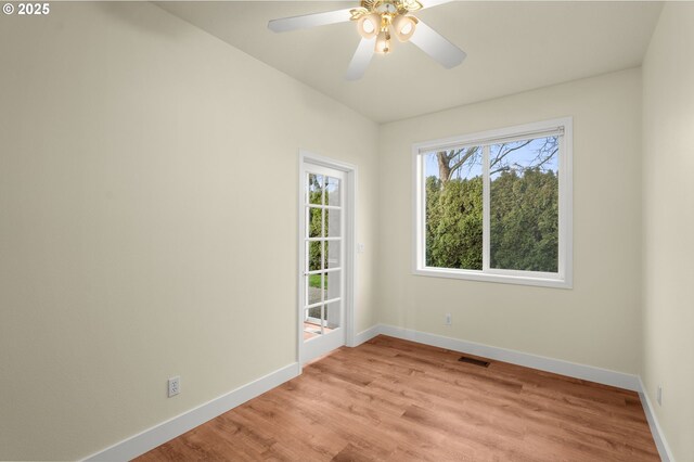 unfurnished room featuring ceiling fan and light hardwood / wood-style floors