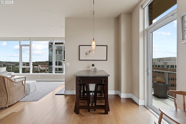 1930 S River Dr Unit W1003, Portland, OR 97201 - dining area with light wood finished floors and baseboards