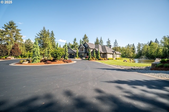 22100 NE 41st Ct, Ridgefield, WA 98642 - view of grassy yard featuring a water view