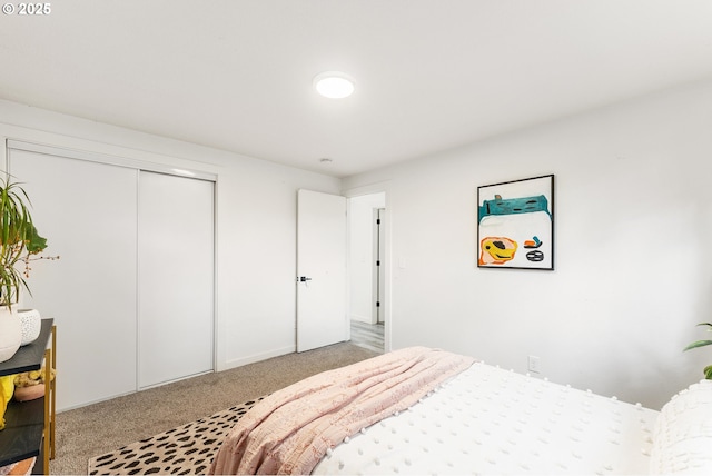 carpeted bedroom with a closet