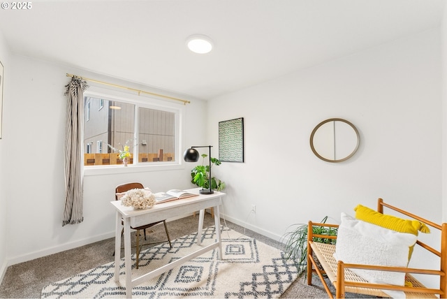 office space with carpet flooring and baseboards