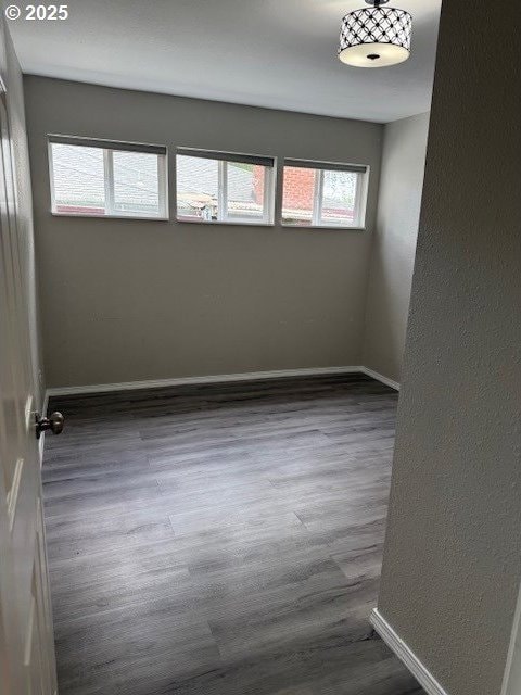 767 32nd Ave, Longview, WA 98632 - spare room featuring wood finished floors and baseboards