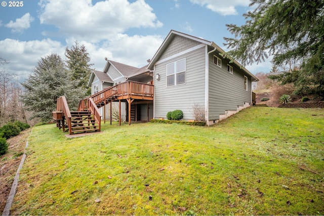 back of property with a deck and a lawn