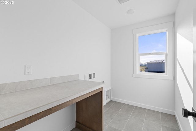2112 NW 17th Pl, Battle Ground, WA 98604 - laundry room with washer hookup, a desk, light tile patterned floors, and electric dryer hookup