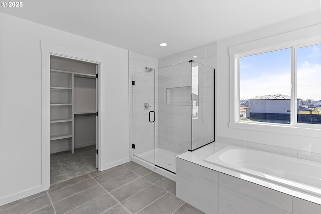 2112 NW 17th Pl, Battle Ground, WA 98604 - full bathroom featuring a stall shower, a garden tub, plenty of natural light, tile patterned flooring, and recessed lighting