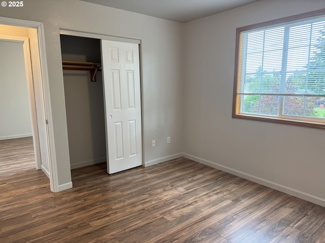 6668 SE 72nd Ave, Portland, OR 97206 - unfurnished bedroom featuring dark wood-style floors and baseboards