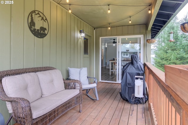 deck with an outdoor hangout area