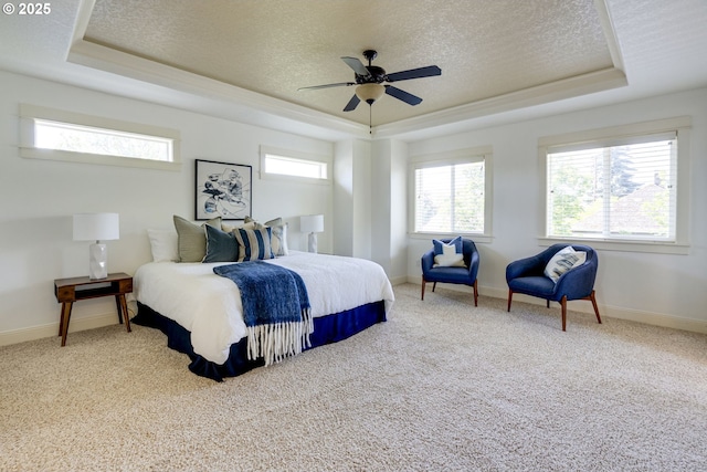 7010 N Kellogg St, Portland, OR 97203 - carpeted bedroom featuring a raised ceiling, a textured ceiling, baseboards, and a ceiling fan