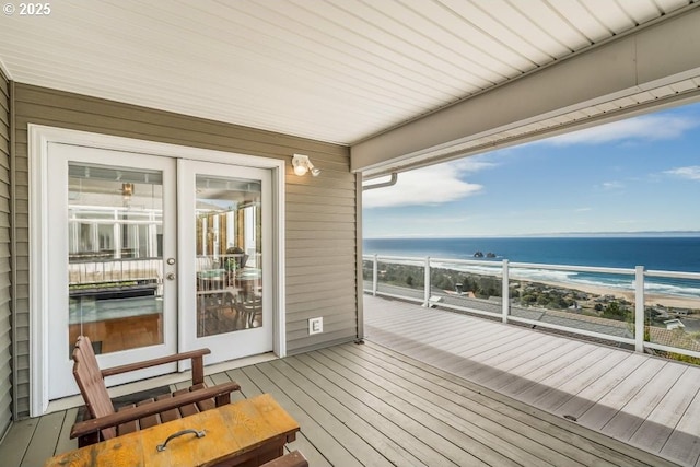 461 Terrace Dr, Rockaway Beach, OR 97136 - wooden deck featuring view of water and beach