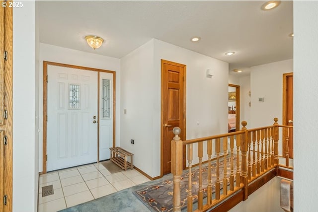 461 Terrace Dr, Rockaway Beach, OR 97136 - entrance foyer with recessed lighting, light tile patterned flooring, and baseboards