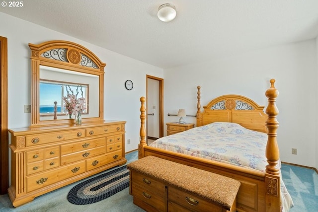 461 Terrace Dr, Rockaway Beach, OR 97136 - carpeted bedroom featuring baseboards