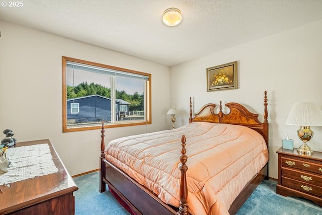 461 Terrace Dr, Rockaway Beach, OR 97136 - bedroom featuring carpet flooring, baseboards, and a textured ceiling