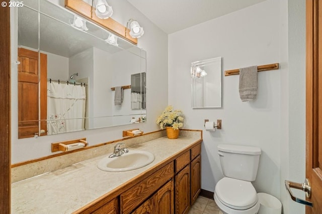 461 Terrace Dr, Rockaway Beach, OR 97136 - full bathroom with toilet, vanity, curtained shower, and tile patterned floors
