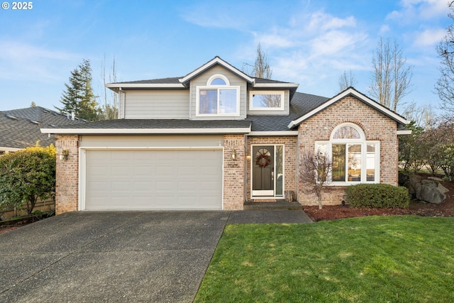 front facade featuring a garage and a front lawn