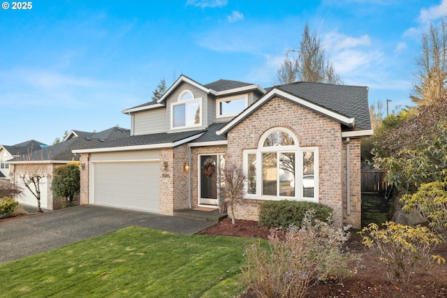 front facade featuring a garage and a front yard