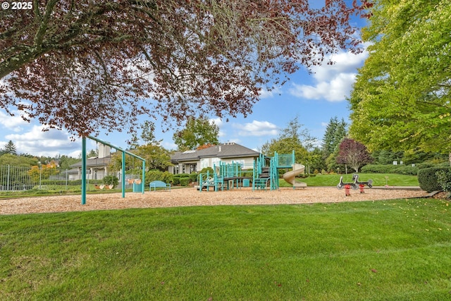 view of jungle gym with a lawn