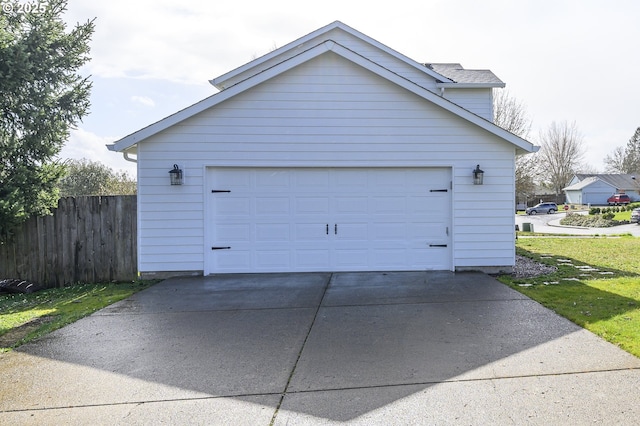 detached garage with fence