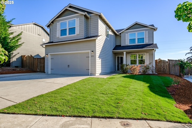 view of front of property with a garage, fence, concrete driveway, and a front yard