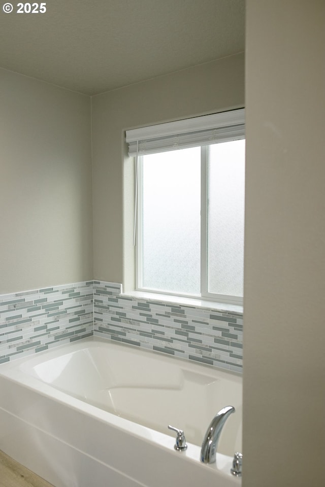 full bath featuring a garden tub