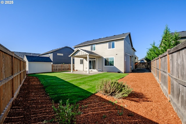 rear view of property with a patio area, a fenced backyard, and a lawn