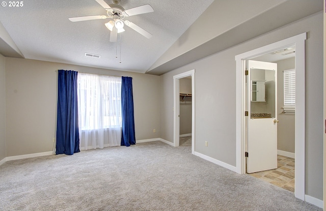 15807 NE 48th Cir, Vancouver, WA 98682 - unfurnished bedroom with carpet flooring, vaulted ceiling, a textured ceiling, a spacious closet, and ceiling fan