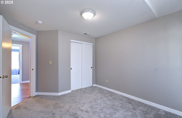 15807 NE 48th Cir, Vancouver, WA 98682 - unfurnished bedroom with carpet, a closet, and a textured ceiling