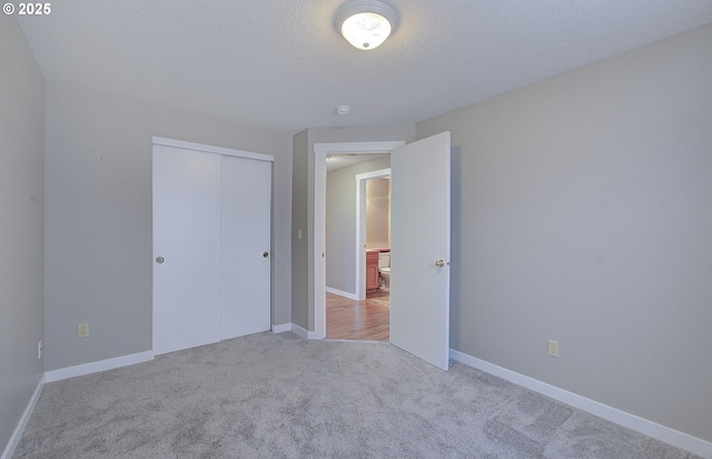 15807 NE 48th Cir, Vancouver, WA 98682 - unfurnished bedroom featuring carpet floors, a closet, and a textured ceiling