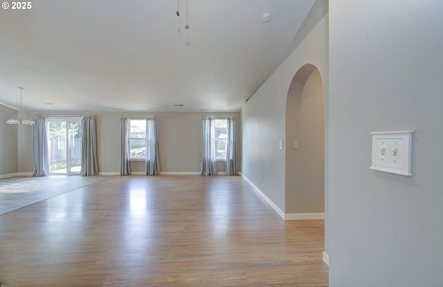 15807 NE 48th Cir, Vancouver, WA 98682 - unfurnished room featuring light wood finished floors and arched walkways