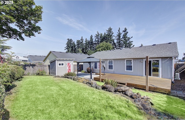 15807 NE 48th Cir, Vancouver, WA 98682 - rear view of property with a gazebo, a fenced backyard, a shed, a deck, and roof with shingles