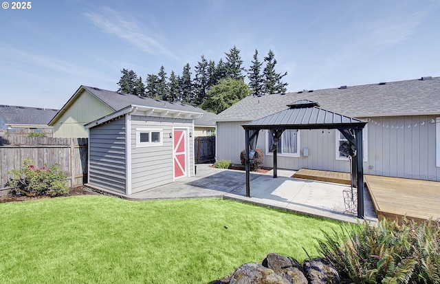 15807 NE 48th Cir, Vancouver, WA 98682 - back of property with a gazebo, a patio, a storage unit, and roof with shingles