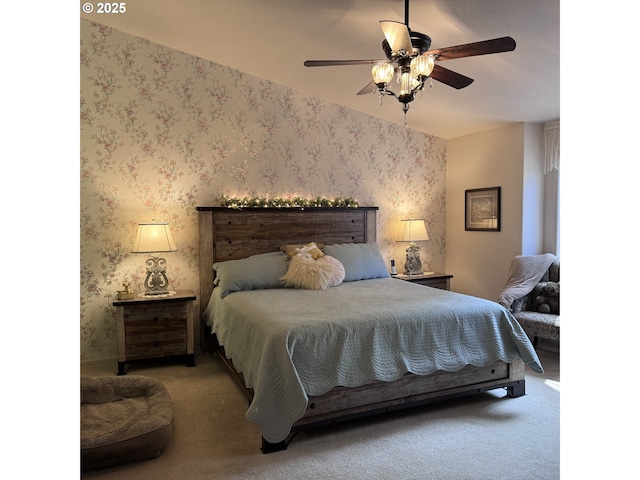 carpeted bedroom featuring ceiling fan and wallpapered walls