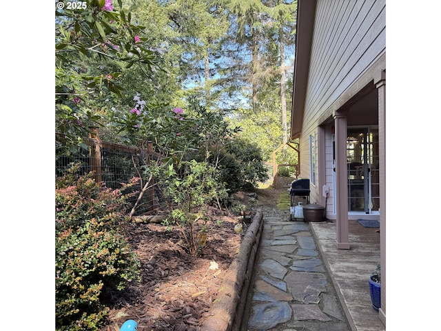 view of yard featuring fence