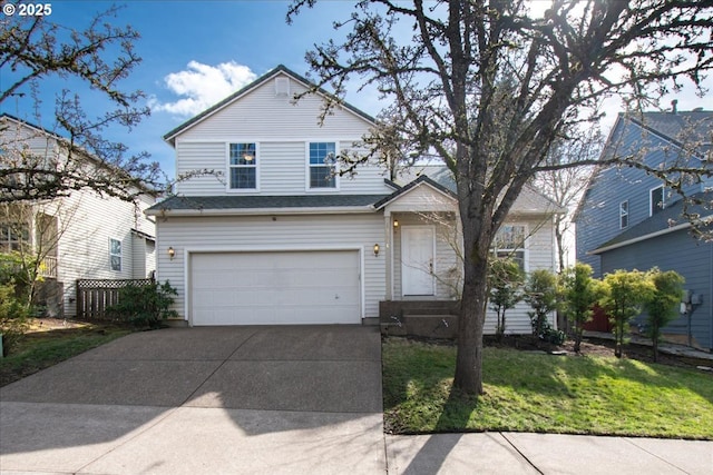 traditional-style house featuring a garage and concrete driveway