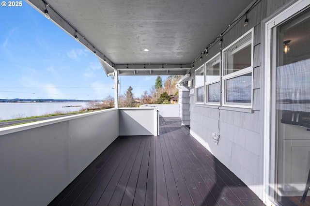 deck featuring a water view