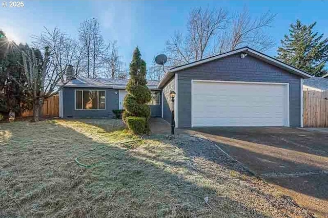 ranch-style home with a garage