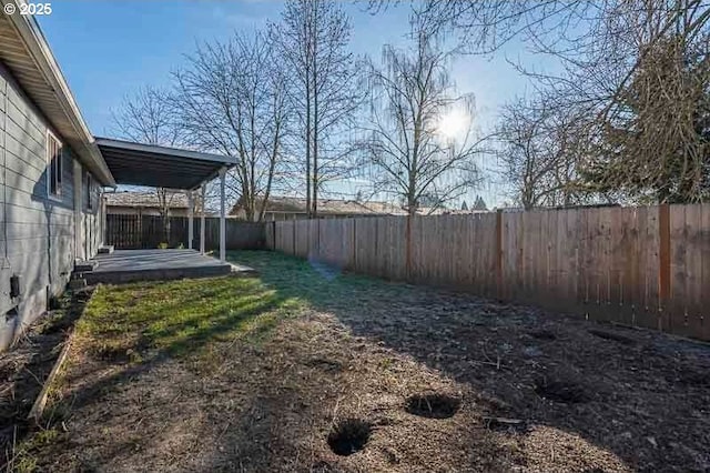 view of yard featuring a fenced backyard