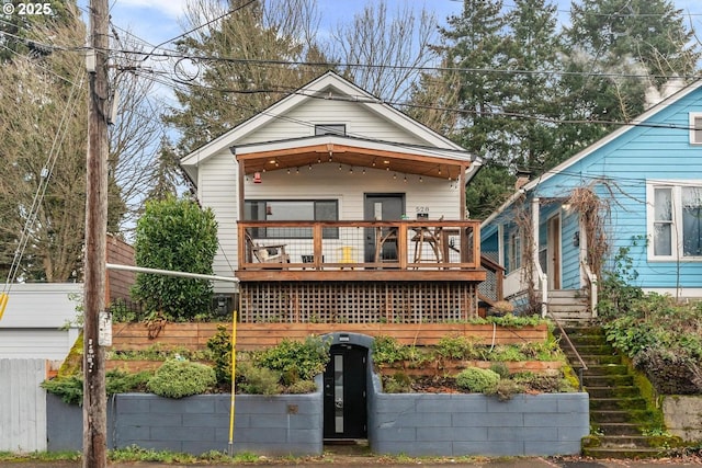 bungalow-style home featuring a wooden deck