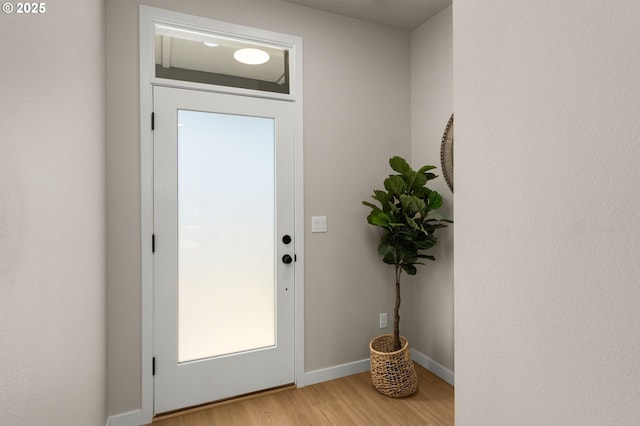 doorway featuring light wood-type flooring