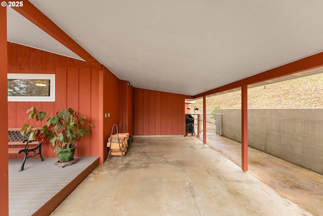 view of patio with a gate