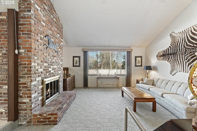 carpeted living room featuring vaulted ceiling, a brick fireplace, and a textured ceiling