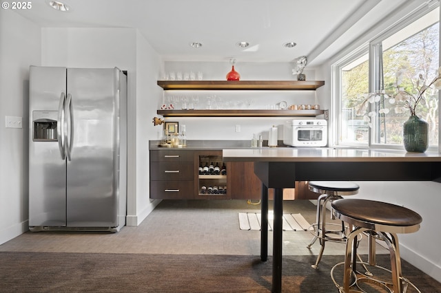 3701 SW 38th Ave, Portland, OR 97221 - indoor bar featuring stainless steel refrigerator with ice dispenser and carpet flooring